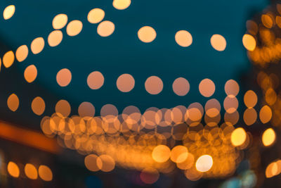 Defocused image of illuminated lights at night