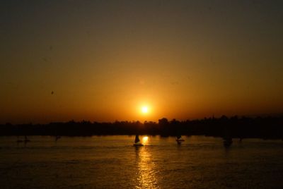 Scenic view of sunset over river