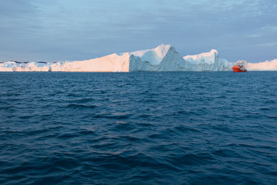 Scenic view of sea against sky during winter