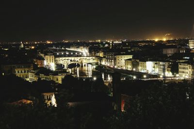 View of illuminated city at night