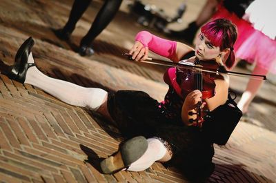 Close-up of woman standing in pond