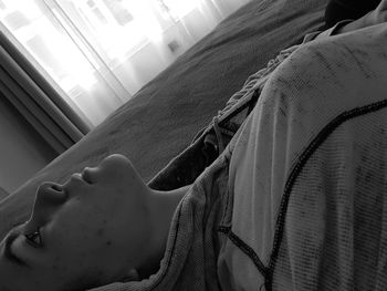 Close-up of man lying on floor