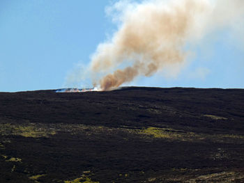 Burning brush in the hills of mennock pass