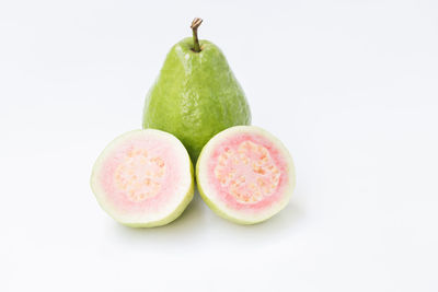 Close-up of fruits against white background