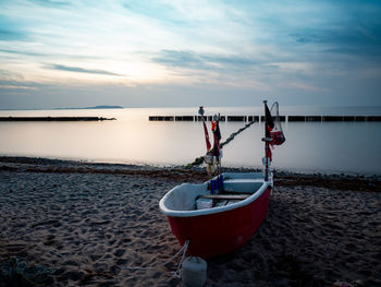 Boat in sea against sky