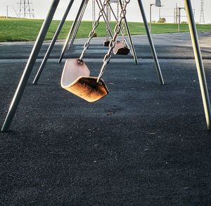 Close-up of swing in playground