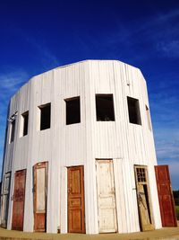 Low angle view of built structure against blue sky