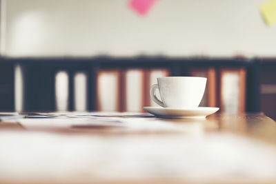 Coffee cup on table