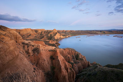 Scenic view of rock formations against sky