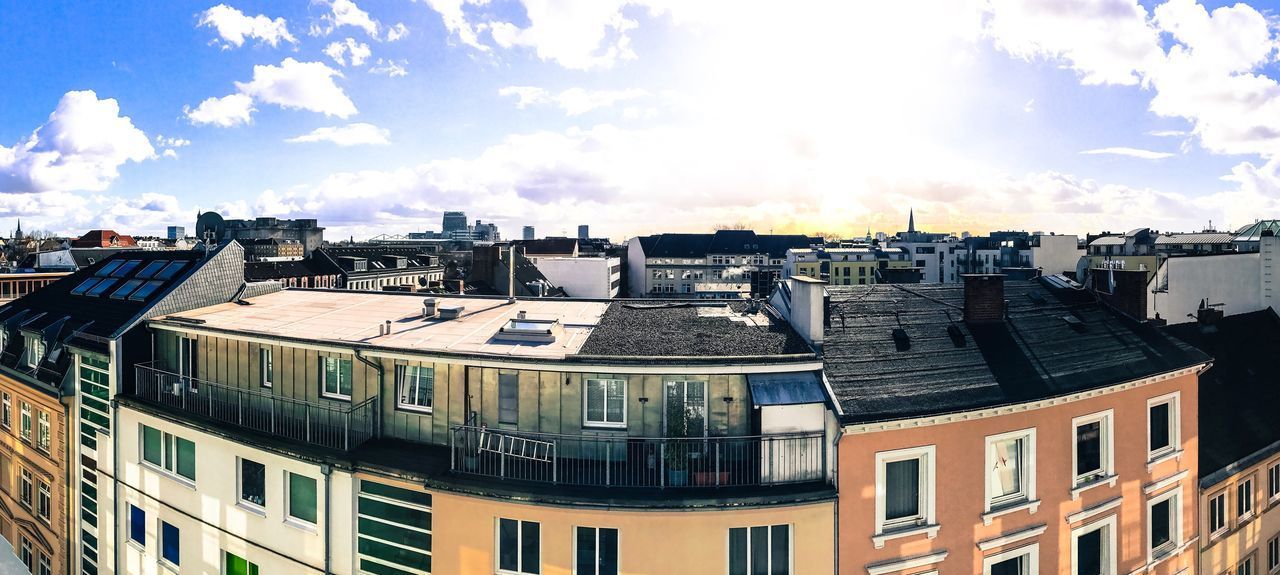 PANORAMIC SHOT OF CITYSCAPE AGAINST SKY