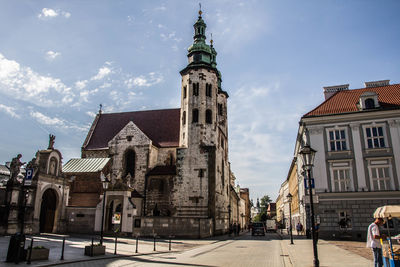 Buildings in city against sky