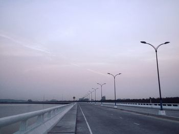 Street amidst highway against sky