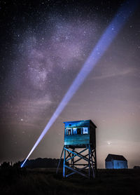 Built structure against sky at night