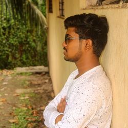 Side view of young man looking away