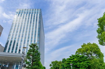 Low angle view of modern buildings against sky