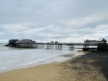 Pier over sea against sky