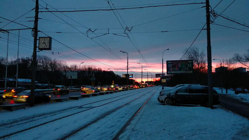 Cars on railroad tracks during winter