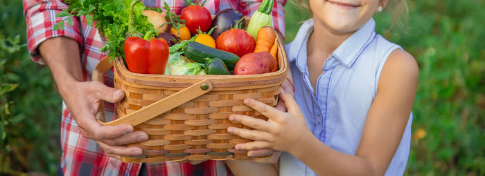 Midsection of woman holding food