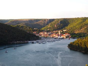 Scenic view of landscape and mountains against sky