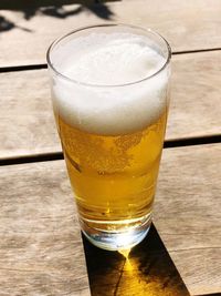 Close-up of beer glass on table