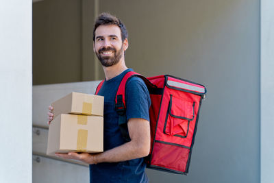 Young man working in box