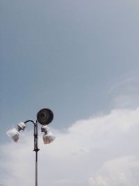 Low angle view of street light against sky