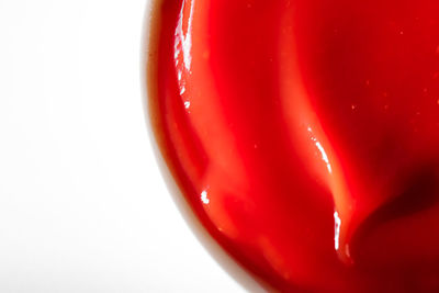 Close-up of tomato against white background