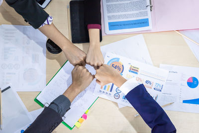 High angle view of people on table