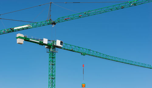 Mobile construction and tower crane at a construction site for building construction