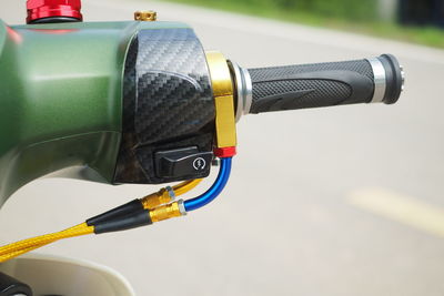 Close-up of bicycle against blurred background