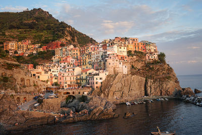 Town by sea and buildings in city