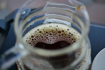 High angle view of drink in glass container