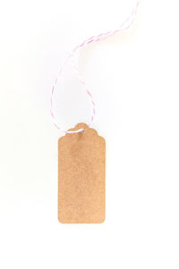 Blank tag from recycling paper isolated on white background