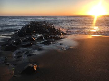 Scenic view of sea during sunset