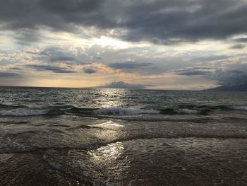 Scenic view of sea against dramatic sky