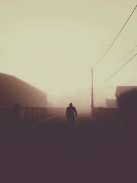 Woman walking on road