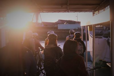 Rear view of people sitting in bus