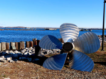 Panoramic view of sea against clear blue sky