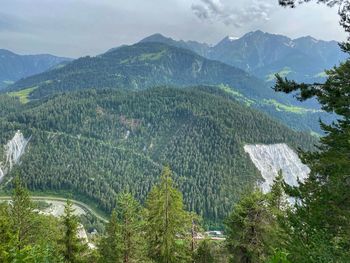 Scenic view of landscape and mountains against sky