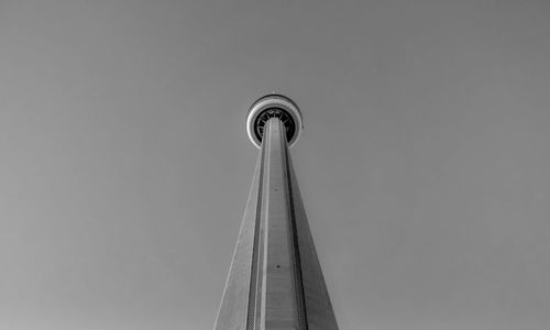 Low angle view of communications tower against clear sky