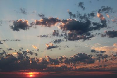 Sun shining through clouds