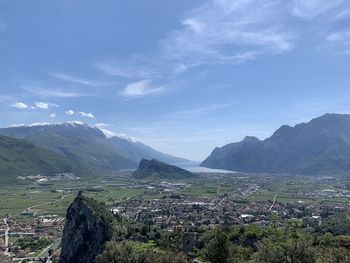 Scenic view of landscape and mountains against sky