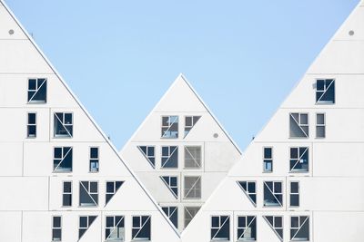 Low angle view of modern building against clear sky