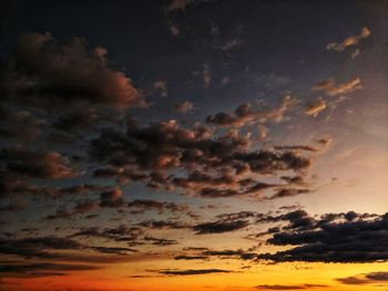 Low angle view of dramatic sky during sunset