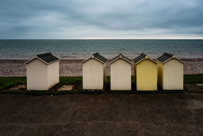 Beach huts against sea