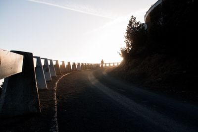 Empty road against clear sky