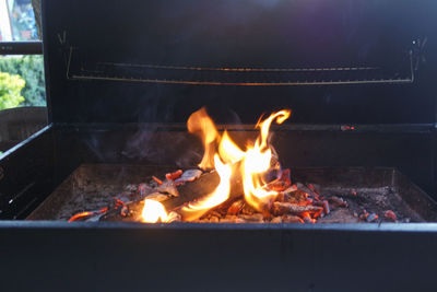 Close-up of fire on barbecue grill