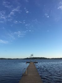 Jetty leading to calm sea