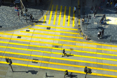 High angle view of people crossing street