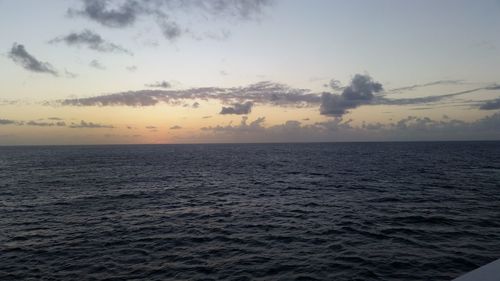 Scenic view of sea against sky at sunset